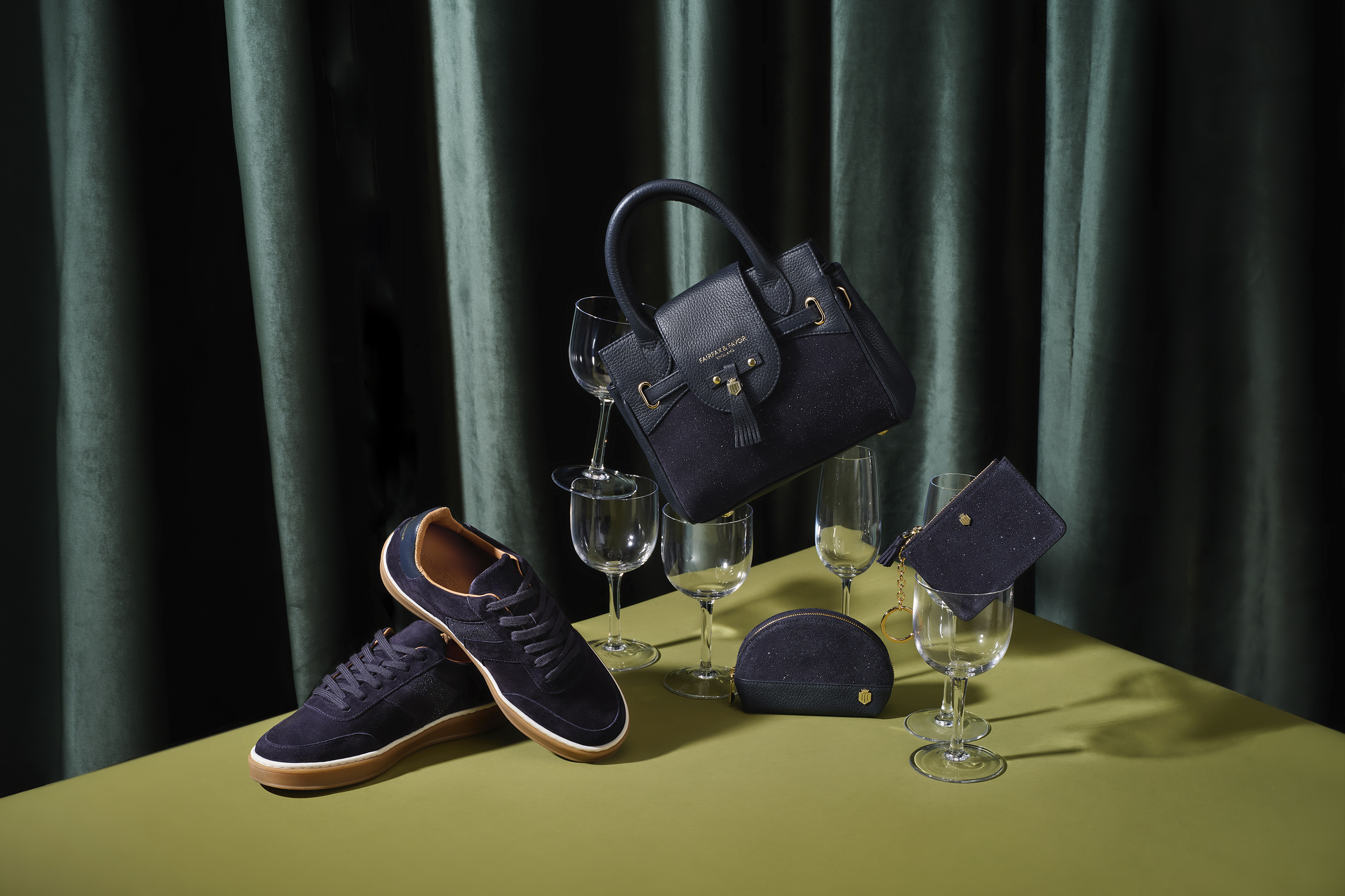 advertising photo shoot A/W for Fairfax and favor set in evening dinner party Scene bag shoes and purse on table